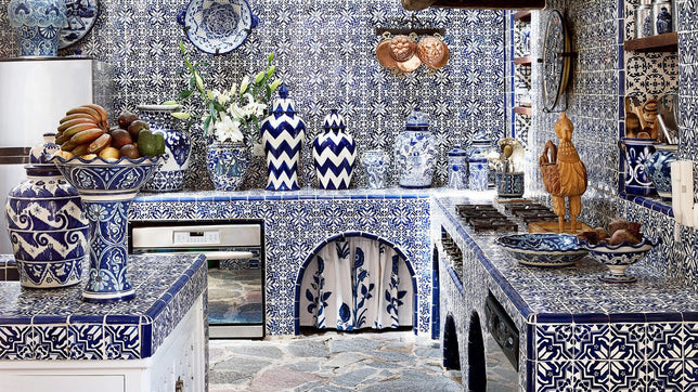 Mexican kitchen, Talavera tiled counter tops, with pottery and elegant decor