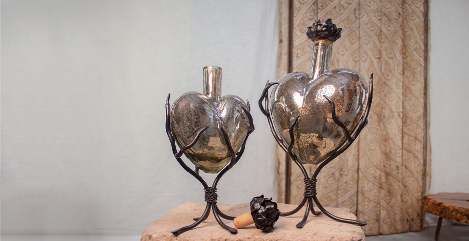 Heart shaped urn blown glass on metal stand