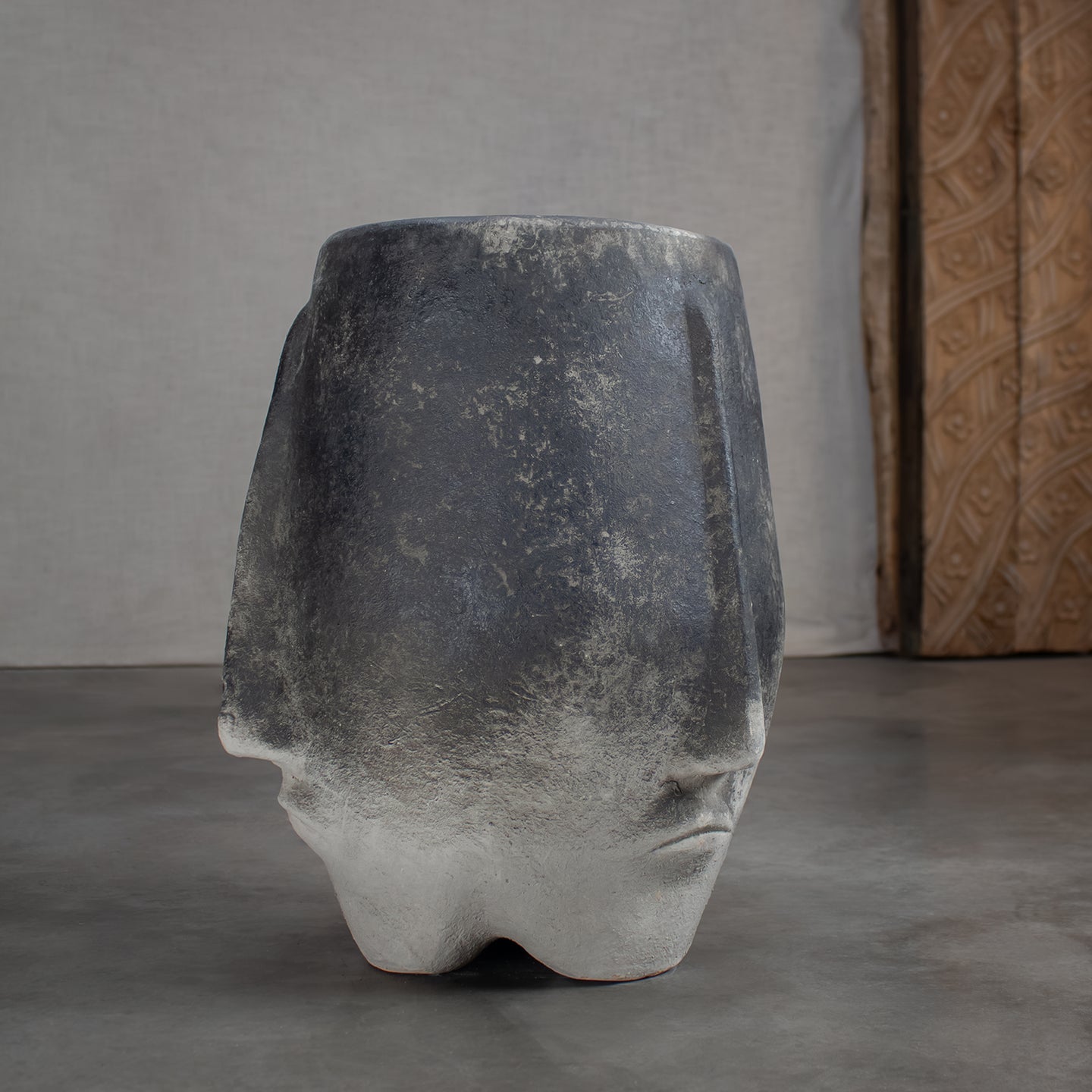 Terracotta face pot.