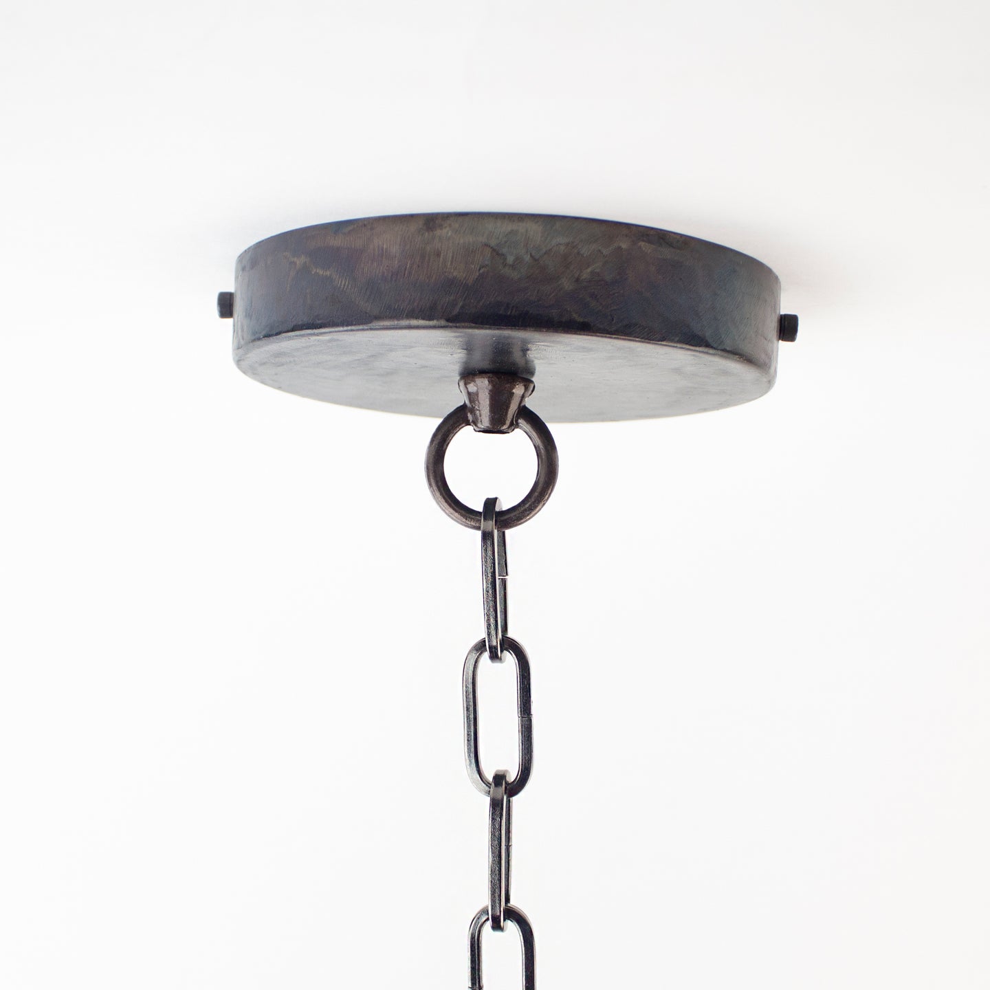 Decorative ceiling canopy and chain for pendant light fixtures.
