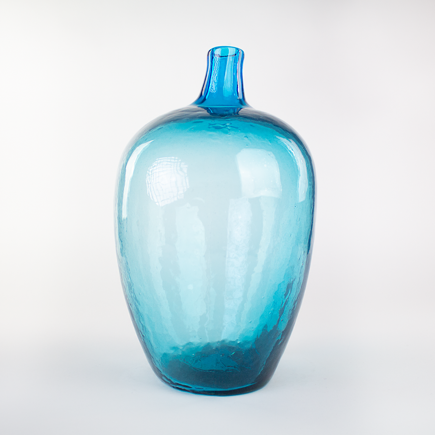 Turquoise glass vase, giant hand blown glass bottle.